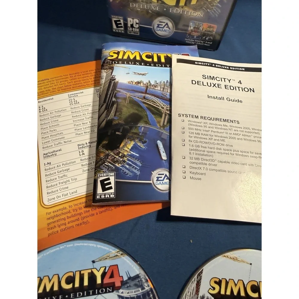 SIM CITY 4: Deluxe Edition (PC Game CD-ROM, 2003) 2 Discs with Manual in Case.